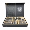 24 piece polished stainless steel cutlery set in open premium black gift box on white background